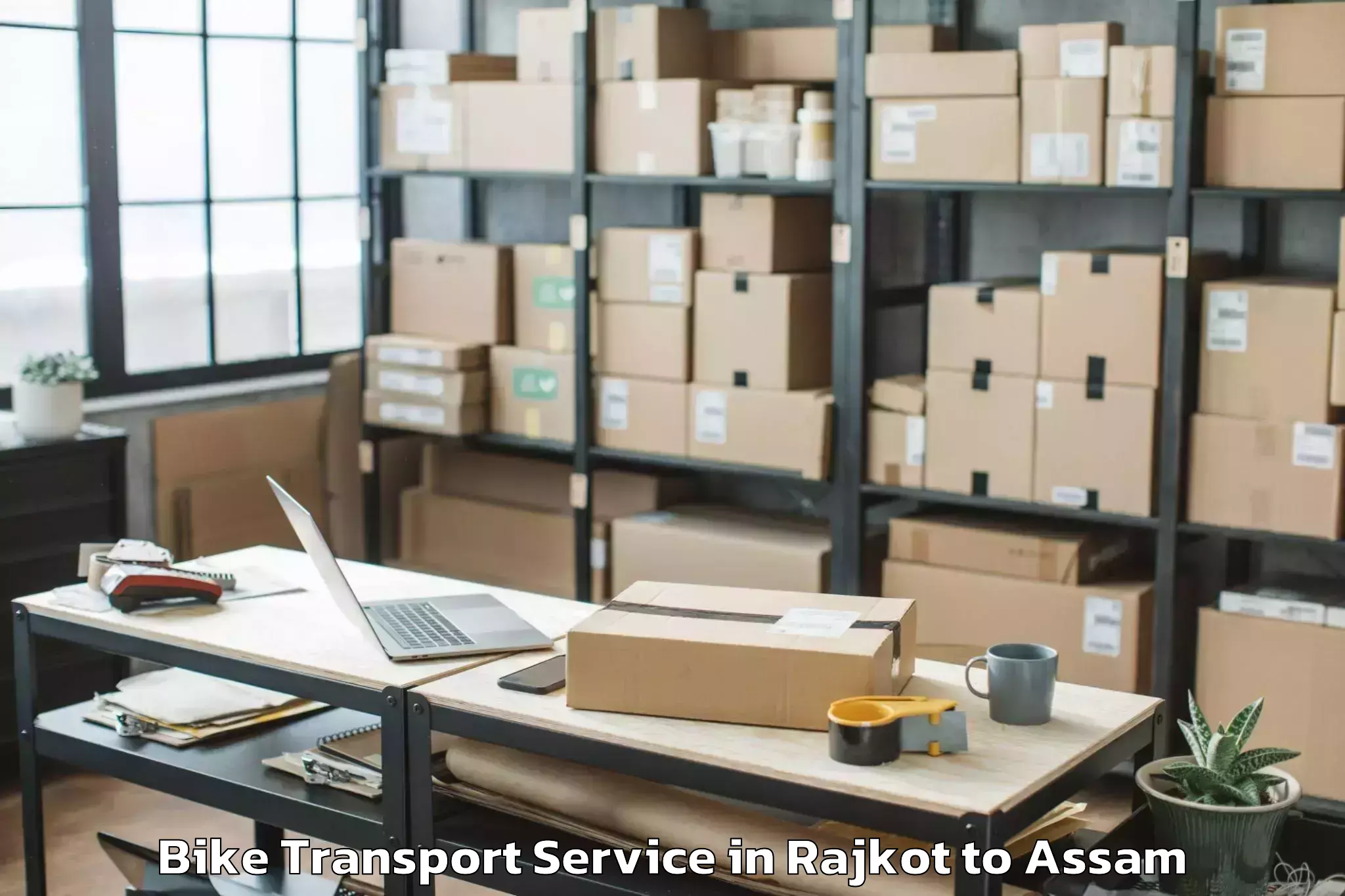 Top Rajkot to Sonapur Bike Transport Available